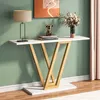 A console table with a lamp, books, and a vase of flowers on it, placed against a green wall. Náhľad obrázku produktu