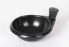 A black frying pan with an egg insert, shown on a white background. Voir les images du produit