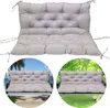 A collage of a gray bench cushion, shown on its own and then in two lifestyle settings: on a swing at the beach and on a swing in a garden. Voir les images du produit