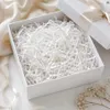 Weißes Papierfüllmaterial 100 g – Dekofüllung für Geschenkkörbe, Boxen & Pakete Produktbild-Vorschau