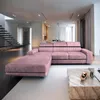 A modern living room with a pink sectional sofa and ottoman. Produktbild-Vorschau