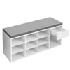 A white shoe bench with a gray cushion and a drawer. Produktbild-Vorschau