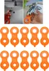 A collage showing a hand using a tool to remove a faucet aerator and a group of the tools. Anteprima dell’immagine prodotto