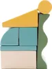A stack of colorful foam building blocks arranged in a whimsical, abstract structure. Produktbild-Vorschau