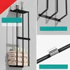 A collage of images showing a black stainless steel towel rack with folded towels and toiletries, and close-ups of the rack's construction. Produktbild-Vorschau