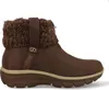 A brown boot with a knitted cuff is shown against a white background. Voir les images du produit