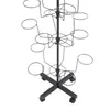 A black metal hat stand with multiple tiers and circular holders for hats, shown on a white background with wheels at the base. Produktbild-Vorschau