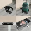 A collage of four images showing different aspects of a height-adjustable desk, including a cup holder, a water bottle in the cup holder, a control panel, and a storage drawer. Anteprima dell’immagine prodotto