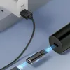 A black adapter is shown connecting a USB-C cable to a black cylindrical device, with a USB-A cable connected to a white power adapter in the background. Náhled obrázku produktu