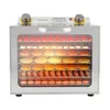 A stainless steel food dehydrator with multiple trays filled with food items. Podgląd zdjęcia produktu