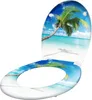 A toilet seat and lid decorated with a tropical beach scene. Náhled obrázku produktu