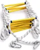 A close-up view of a fire escape ladder made of rope and wooden rungs. Produktbild-Vorschau