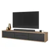 A modern TV stand with a television and decorative items. Náhled obrázku produktu