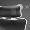 Close-up view of the headrest and upper backrest of an ergonomic office chair. Voir les images du produit