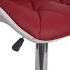 A close-up view of the seat and adjustment lever of a bar stool. Náhled obrázku produktu