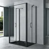 A modern bathroom with a black framed glass shower enclosure. Produktbild-Vorschau