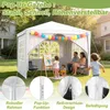 A family is enjoying a day outdoors with a pop-up gazebo set up in a backyard. Voir les images du produit