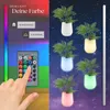 A collage showing a remote control and a hand interacting with it on the left, and several LED-illuminated plant pots in different colors against a starry background on the right. Náhled obrázku produktu