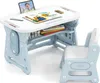 A child's desk and chair set, with books, art supplies, and a tablet displayed on the desk. Produktbild-Vorschau