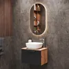 A modern bathroom vanity with a sink and mirror. Produktbild-Vorschau