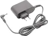 A gray power adapter with a coiled cord and a European plug. Produktbild-Vorschau