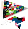 A triangular box and scattered puzzle pieces of the game Eckolo. Produktbild-Vorschau