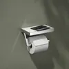 A toilet paper holder with a shelf mounted on a gray wall. Produktbild-Vorschau