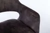 A close-up view of the armrest and seat of a dark gray upholstered chair. Produktbild-Vorschau