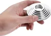 A hand holding a set of metal bearing puller sleeves. Náhled obrázku produktu
