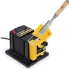 A chisel sharpening machine with a chisel inserted. Produktbild-Vorschau