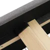 Close-up view of the underside of a sofa bed, showing wooden support beams and grey fabric. Anteprima dell’immagine prodotto