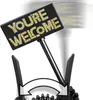 A close-up of a rotating sign with the words "YOU'RE WELCOME" lit up in yellow. Produktbild-Vorschau