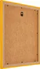 The back of a yellow picture frame with a brown backing board. Produktbild-Vorschau
