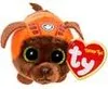 A small, plush toy dog wearing an orange hat, with a red heart-shaped tag attached. Podgląd zdjęcia produktu