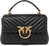 A black quilted handbag with gold bird emblem. Voir les images du produit