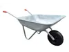 A silver wheelbarrow with red handles and a black wheel is shown against a white background. Náhľad obrázku produktu