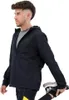 A man is stretching while wearing a black Under Armour jacket. Náhled obrázku produktu