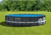 An Intex above-ground swimming pool is set up on a green lawn with trees in the background. Náhľad obrázku produktu