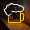 A neon sign shaped like a beer mug with foam is displayed on a shelf. Náhled obrázku produktu