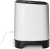 A white and black air purifier with a cord plugged into its side, set against a white background. Náhľad obrázku produktu