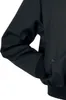 Close-up of a black jacket sleeve. Anteprima dell’immagine prodotto