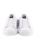 A pair of white Puma sneakers are shown from the front against a white background. Produktbild-Vorschau