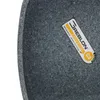 A close-up of a speckled gray surface, likely a pan or pot, with a label attached. Produktbild-Vorschau
