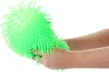 Hands holding a green puffer ball. Produktbild-Vorschau