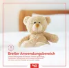A teddy bear sitting on a white surface, with text and a logo in the foreground. Produktbild-Vorschau