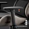 Close-up of a gaming chair's armrest and seat. Produktbild-Vorschau