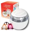 A white ice cream maker is shown next to its packaging, with scoops of ice cream in the foreground. Náhľad obrázku produktu