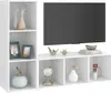 A white TV cabinet with shelves displaying various decorative items. Náhled obrázku produktu