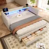 A modern bed with integrated lighting and storage, set in a bedroom. Podgląd zdjęcia produktu