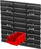 A black tool panel with multiple slots and a red storage bin in the foreground. Anteprima dell’immagine prodotto